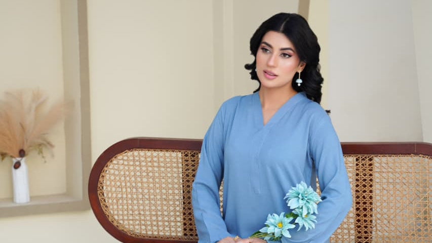 A serene expression of calm and timeless charm. This long coord set in powder blue is crafted from premium linen, offering a breezy yet polished look for any occasion. The design features delicate frill lace detailing along the sleeves, trouser hems, and borders — adding a graceful feminine touch to its minimal silhouette. Light, elegant, and effortlessly chic, Azure Mist brings understated sophistication to your wardrobe.
• Powder Blue Colour
• Stitched Article
• 2 Piece (Kurti + Trousers)
• Premium Linen 